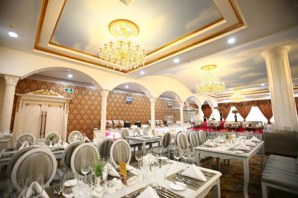 Luoyang Grand Hotel المطعم الصورة